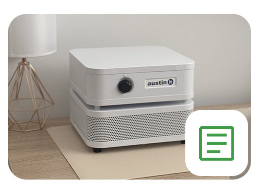 White air purifier with green blog and article icon on the right