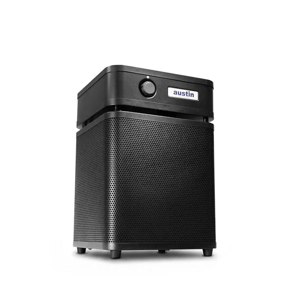 White air purifier standing at a 3/4 angle in black color