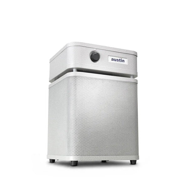 White air purifier standing at a 3/4 angle in sandstone color