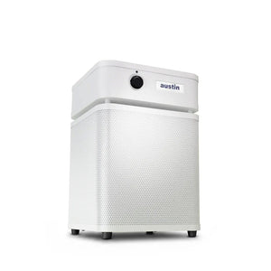 White air purifier standing at a 3/4 angle in white color