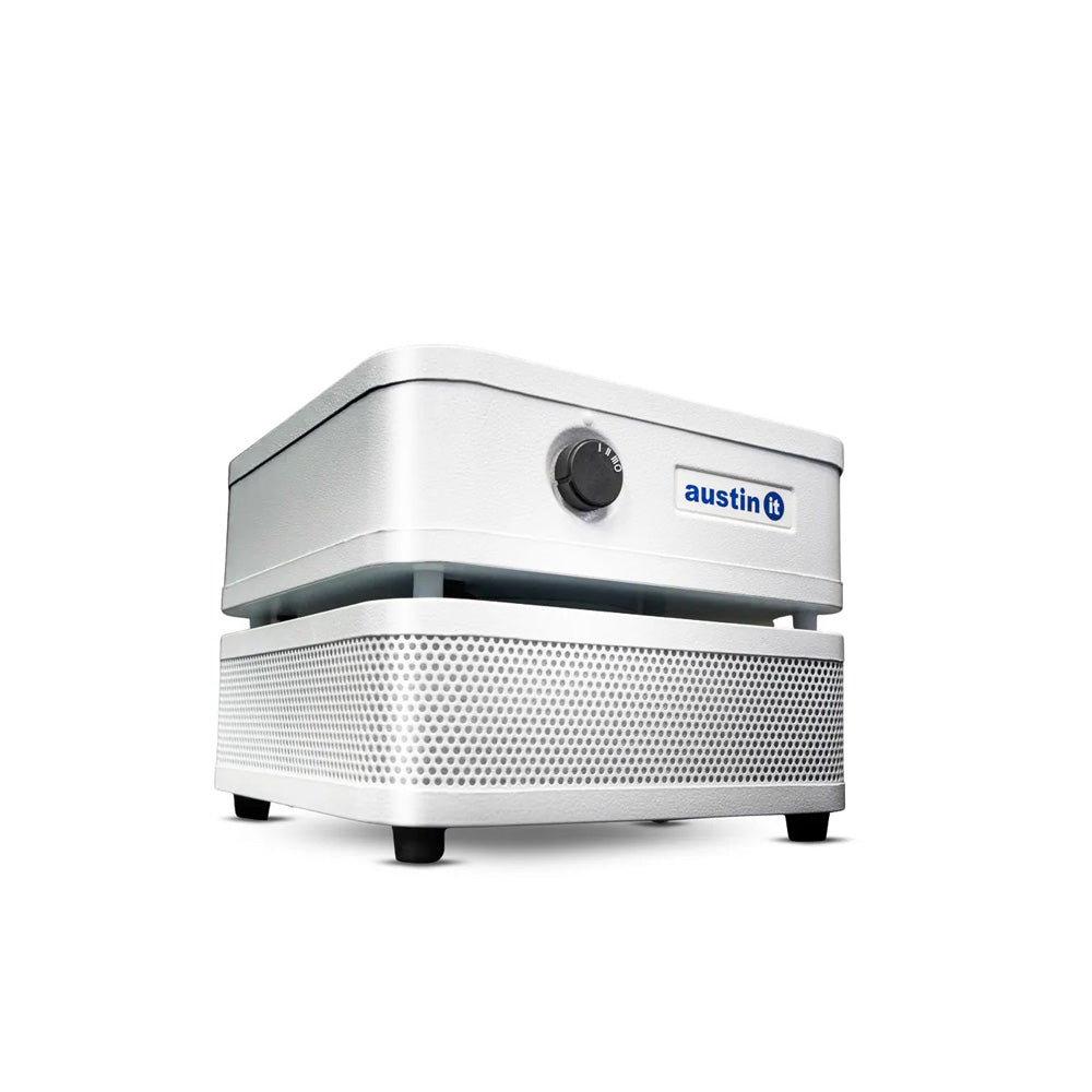 White small personal size rectangular Austin air purifier on a white background with soft shadows facing right 3/4