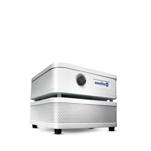 White small personal size rectangular Austin air purifier on a white background with soft shadows facing right 3/4