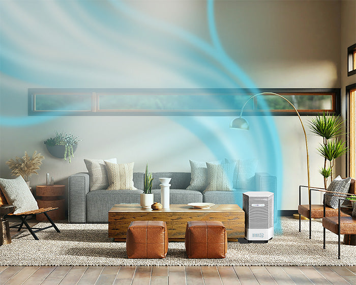 Air purifier in a large living room with blue air flow graphics