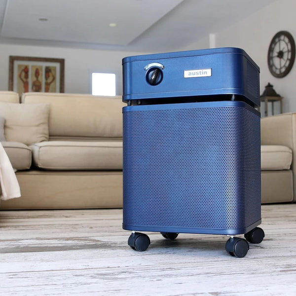 Blue air purifier in a living room setting