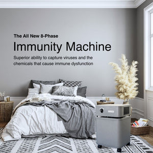 Modern bedroom with an 'Immunity Machine' air purifier device next to the bed