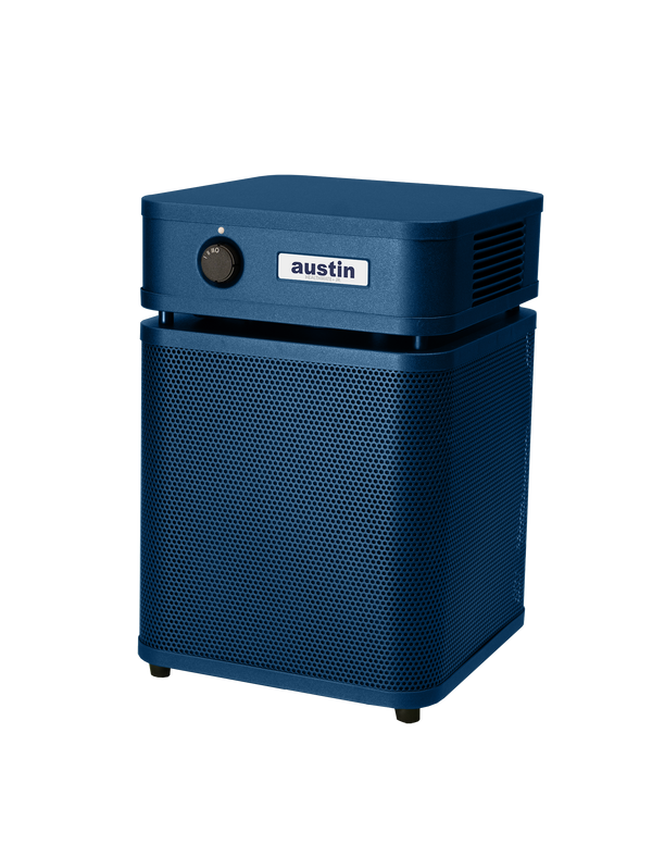 Blue rectangular Austin air purifier on a white background facing left 3/4
